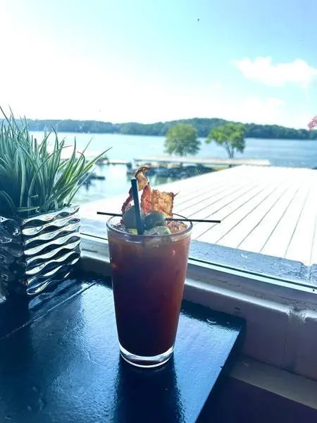 Bloody Mary with bacon and lake view
