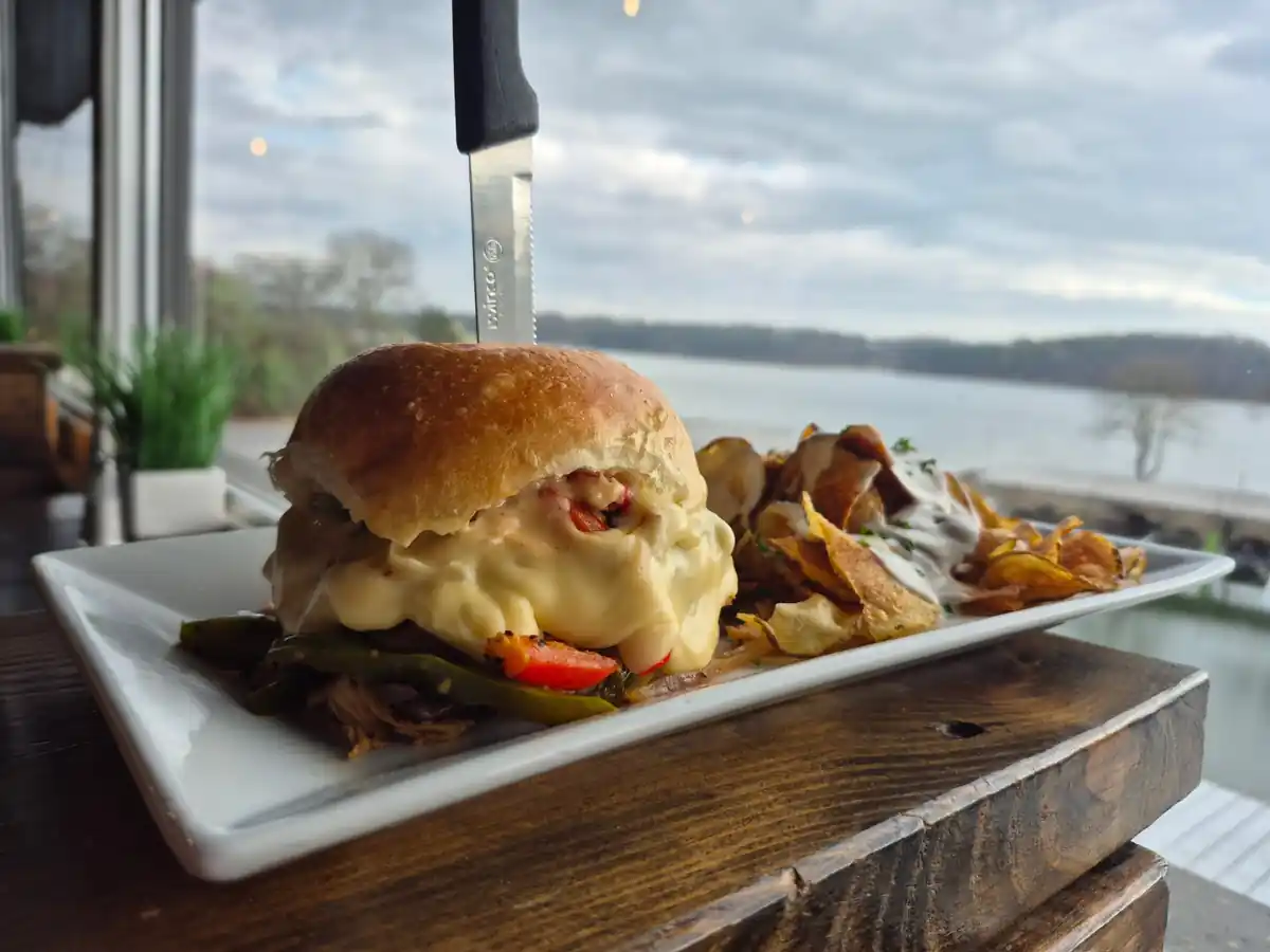 Chipotle Chicken Philly Cheesesteak with house chips