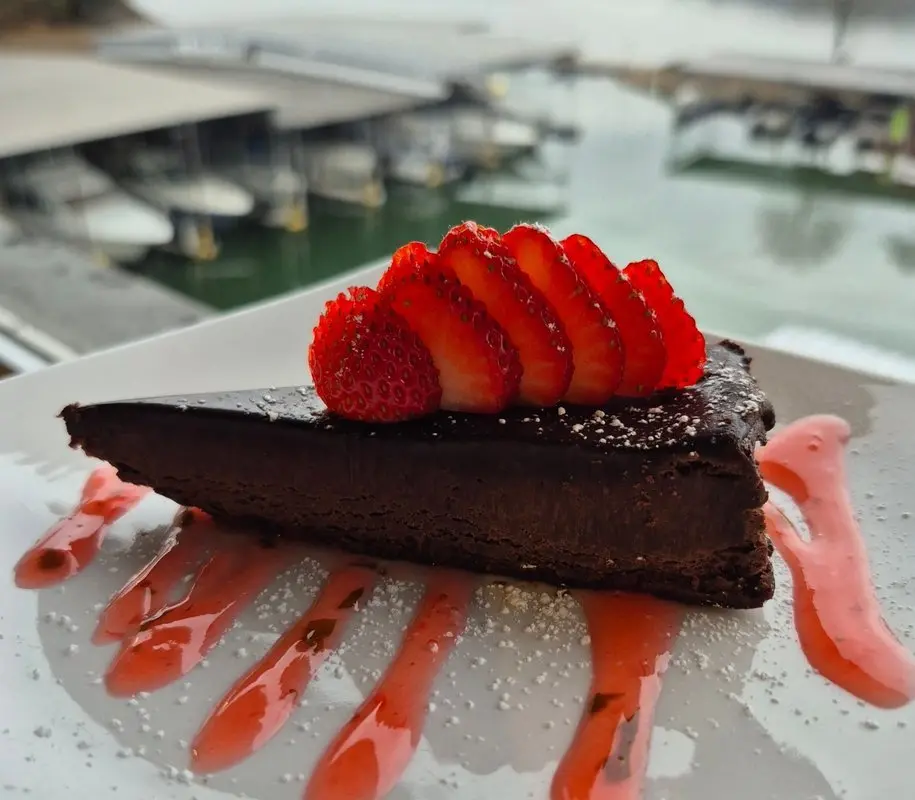 Flourless chocolate cake with strawberries overlooking Chickamauga Lake